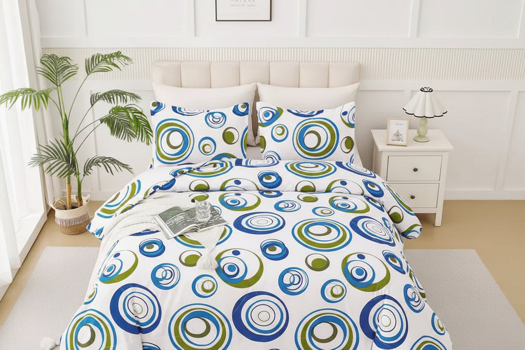 Bed with circular patterned bedding in a bright bedroom