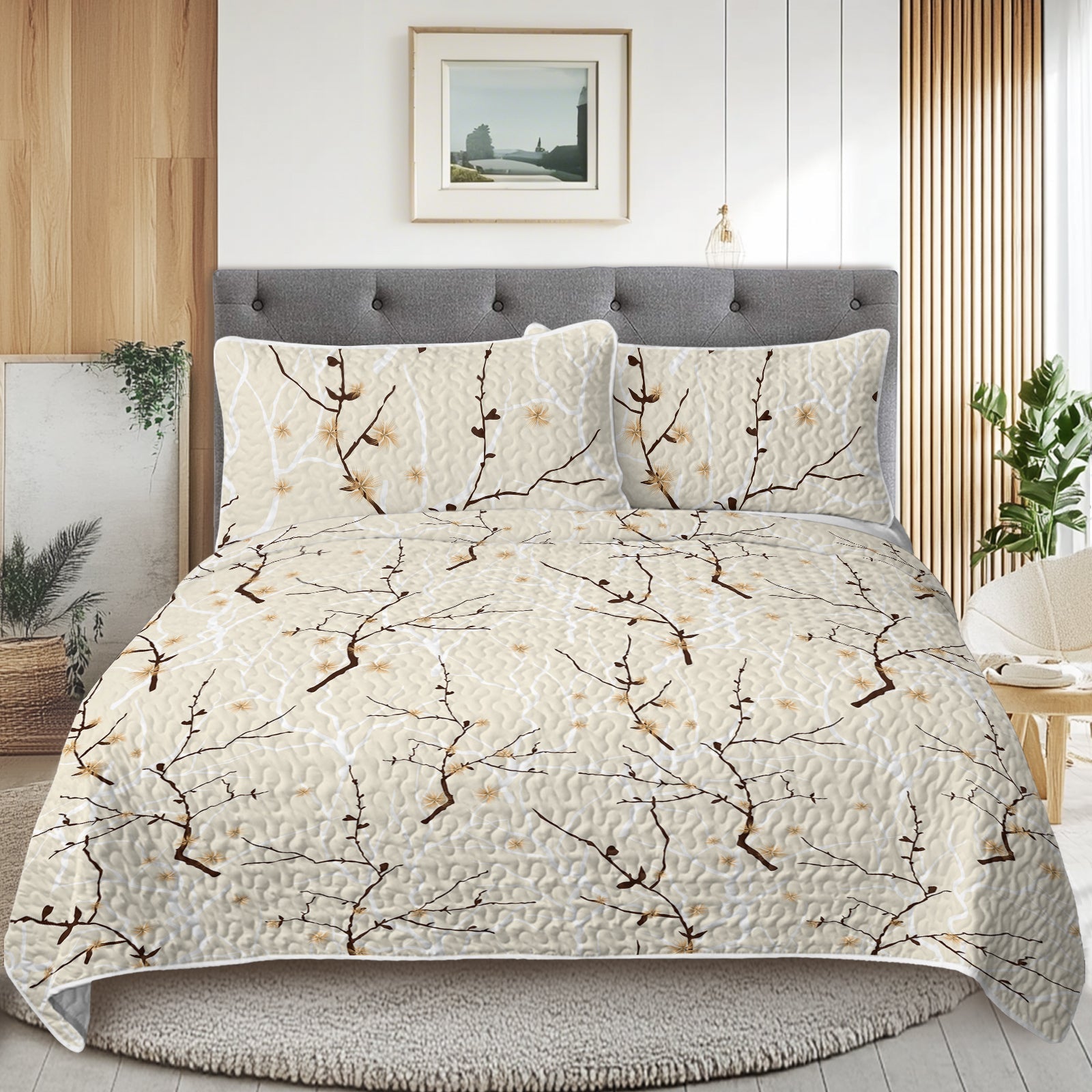 Bed with floral-patterned comforter and pillows in a bedroom setting