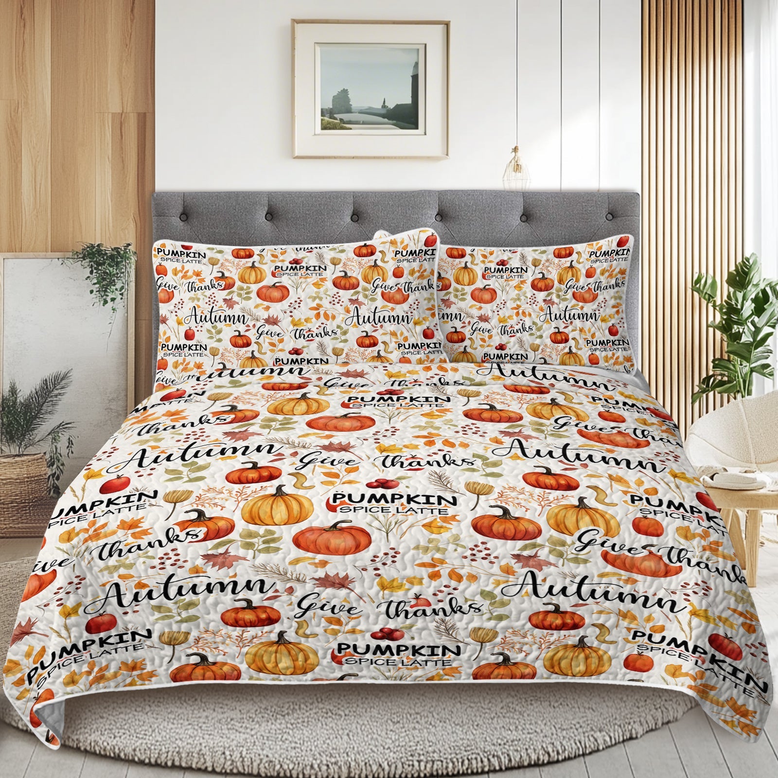 Bedding set with autumn-themed design featuring pumpkins and fall phrases on a bed in a bedroom.