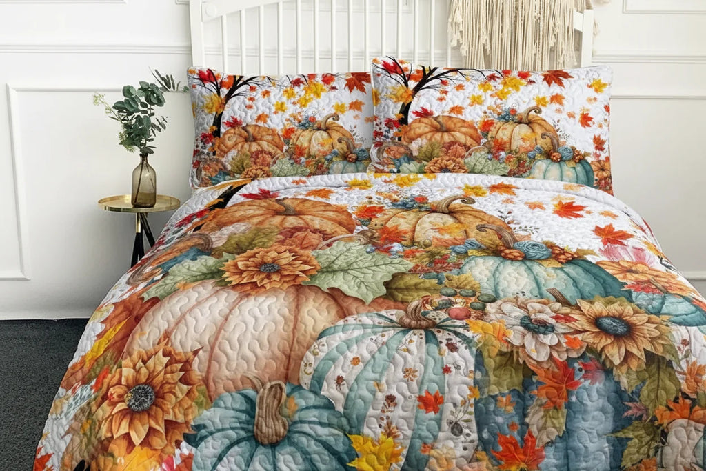 Bedding set with pumpkins and leaves on a bed in a bedroom setting.