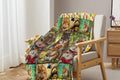 Colorful quilt with squirrel design draped over a chair in a room.