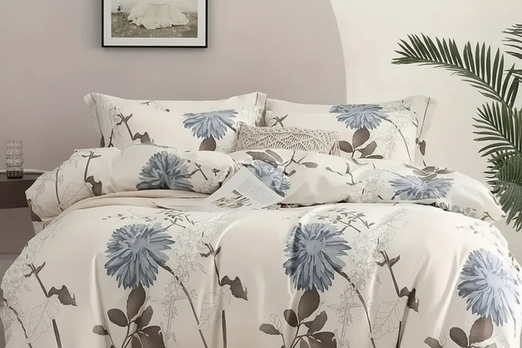 Floral patterned bedding set on a bed in a bedroom setting.