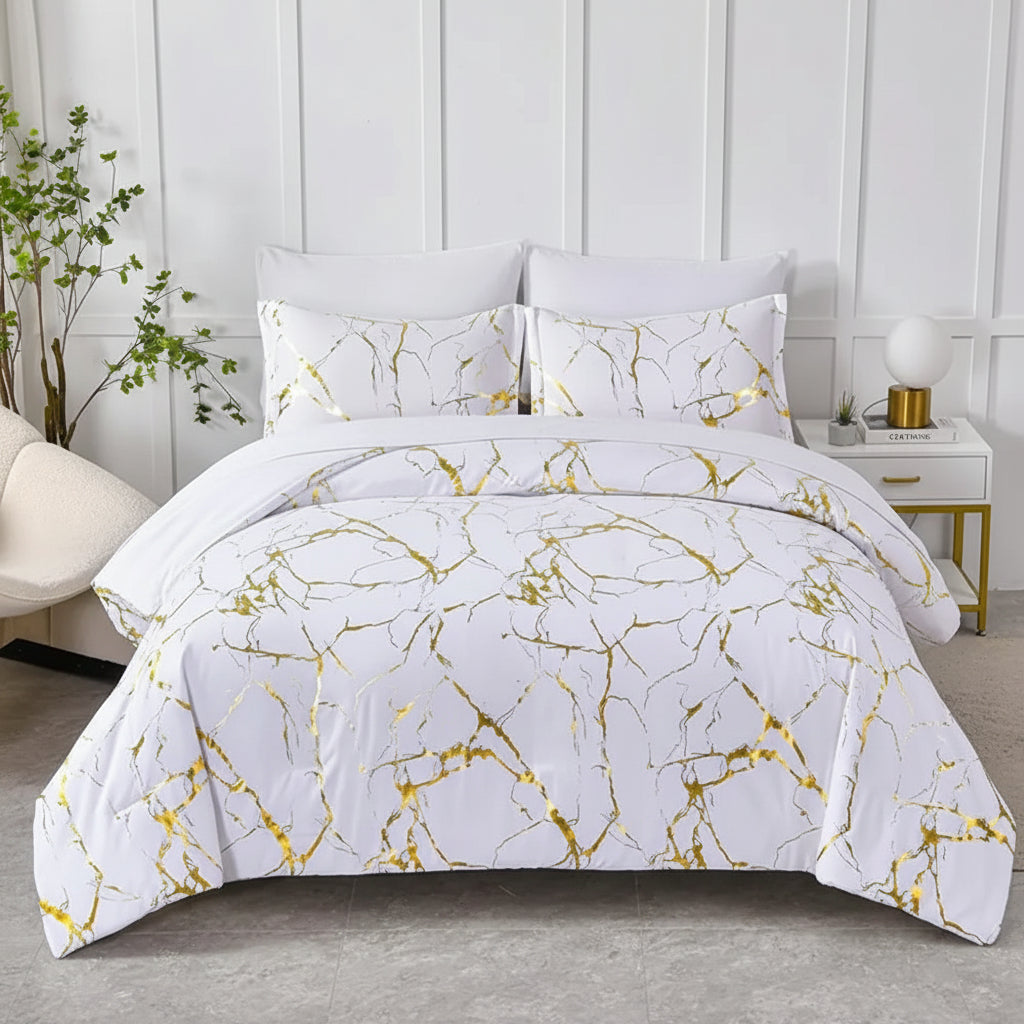 Marble-patterned comforter set on a bed in a bedroom setting.