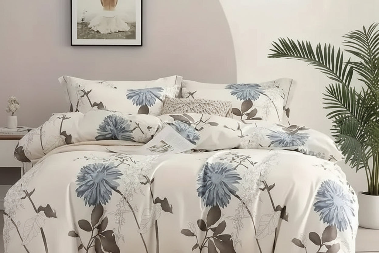Floral patterned bedding set on a bed in a bedroom setting.